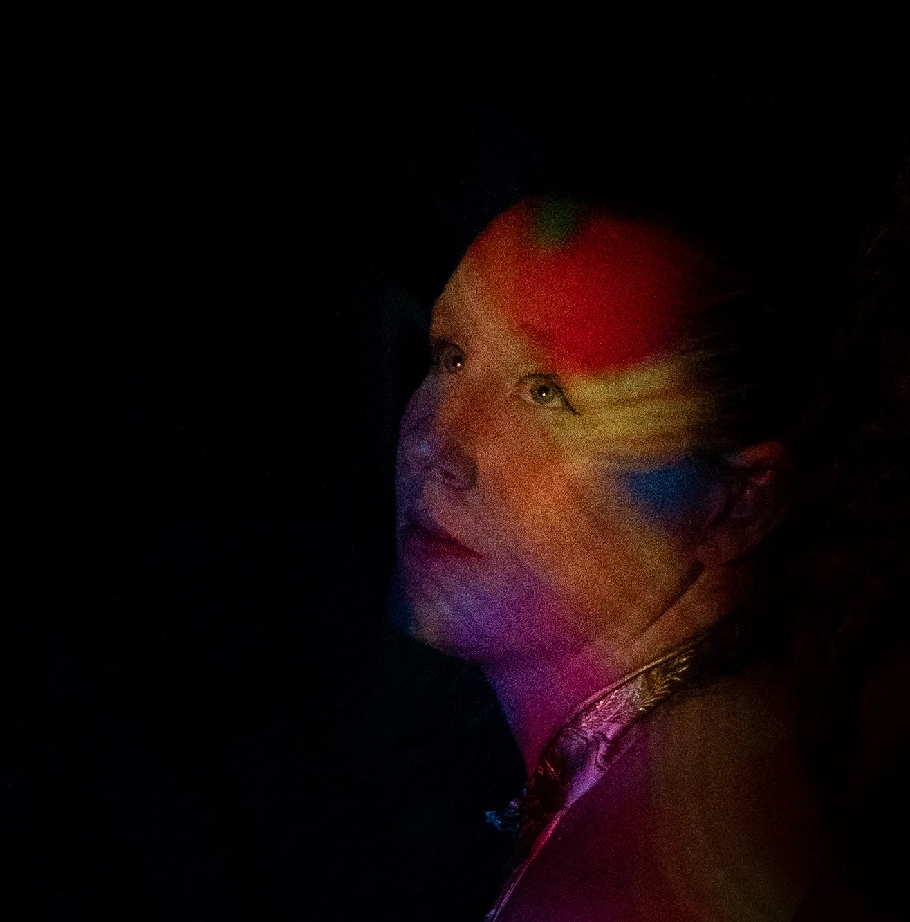 Projection portrait with layered multicolored light